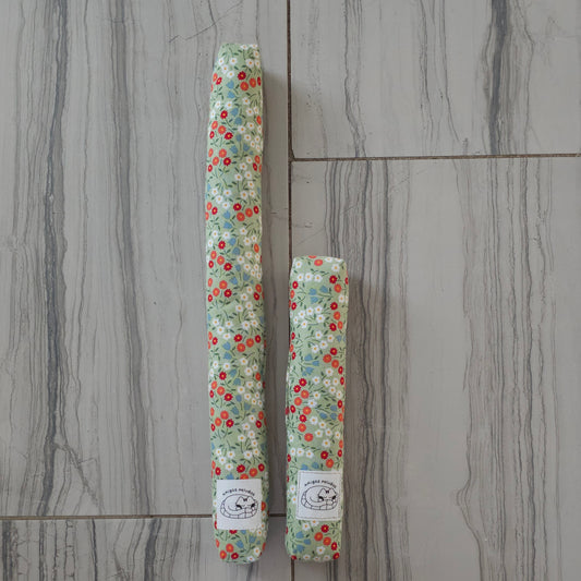 Light blue with red, yellow, and blue little flowers